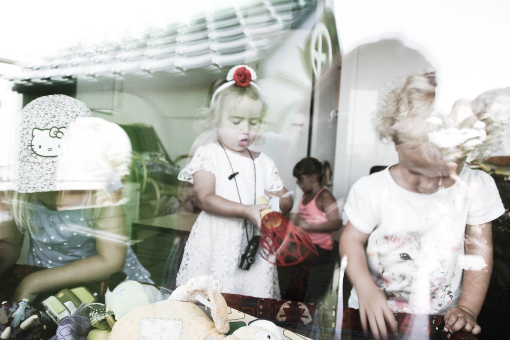 window shots of kids playing (1 of 1)